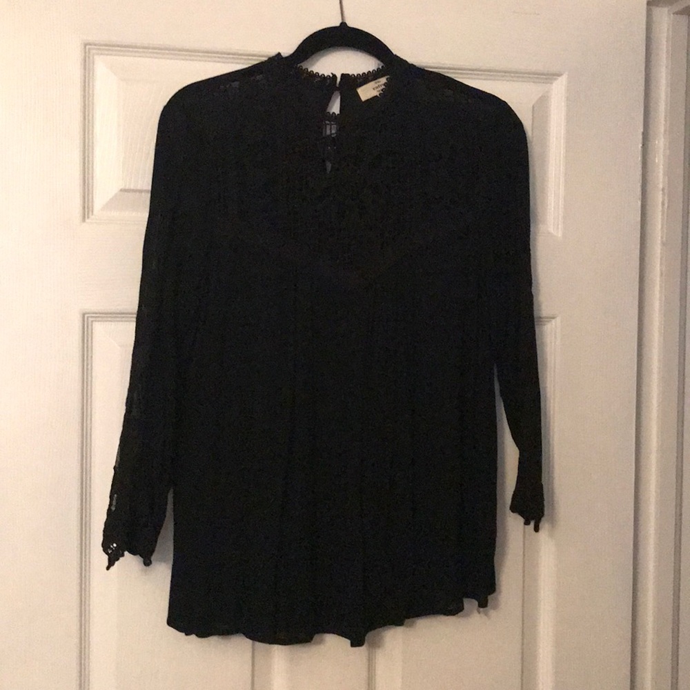 Black flowy top.